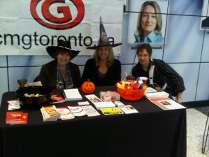 Maureen Brosnahan, Jordanna Lake and Glen Guerin share information and treats 